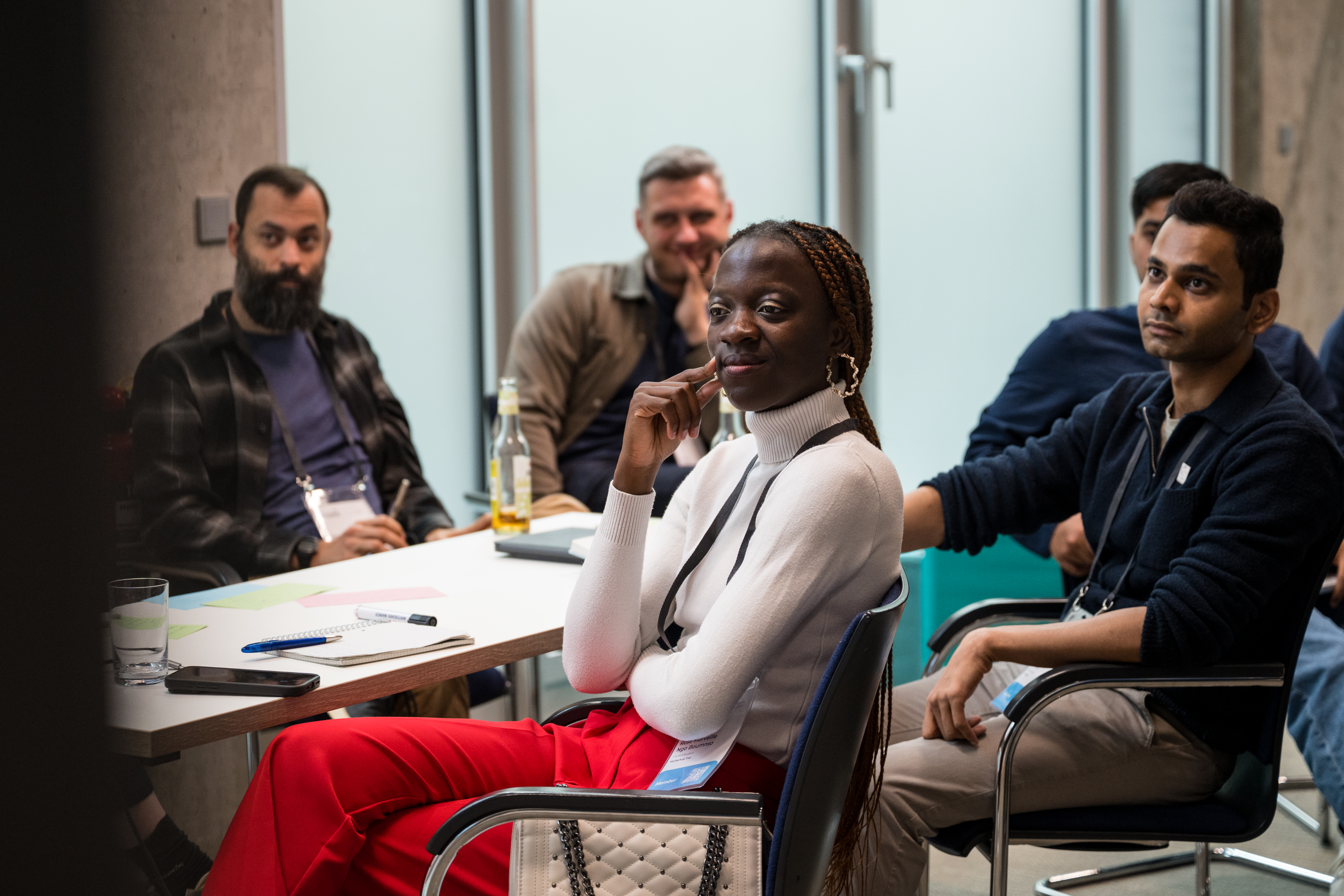 Participants collaborating during an AI for Impact workshop at AI Grid Summit 2026